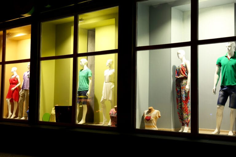 Fashion show in store window